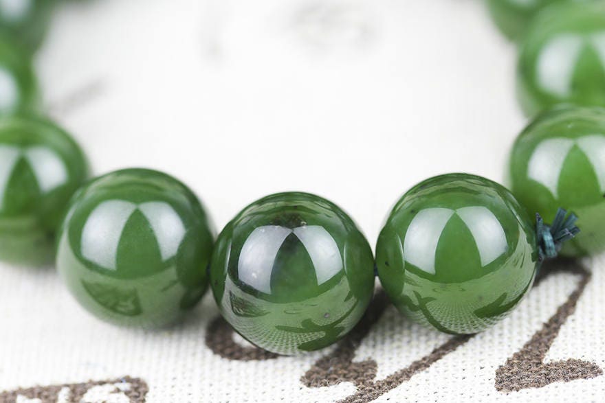 Kanadischer Jaspis Top 16mm Grade apfelgrüner Nephrit Jade Perlen Armreif Pounamu Maori Nephrit NZ Jade Jaspis Jade Armreif Kugelform